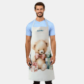 クリスマスプレゼントが贈られる可愛いテディベア エプロン (着用した状態)