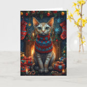 クリスマスプレゼントと暖炉のスフィンクス猫 カード (黄色い花)