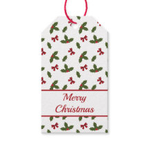 クリスマスプレゼントのホリー植物と赤い弓のパターン