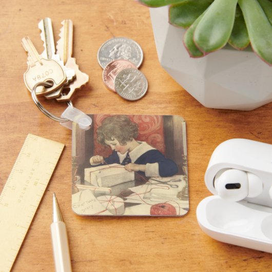 クリスマスプレゼントのラッピング、ジェシー・ウィルコックス・スミス キーホルダー (デスク)