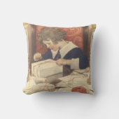 クリスマスプレゼントのラッピング、ジェシー・ウィルコックス・スミス クッション (正面)