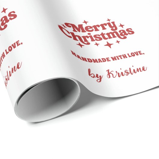 クリスマスプレゼントの包装によって作られた赤い白の手作り ラッピングペーパー (ロールコーナー)