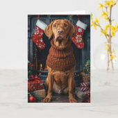 クリスマスプレゼントの暖炉を持つビズラ犬 カード (黄色い花)