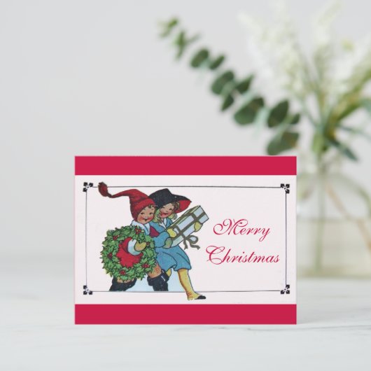 クリスマスプレゼントを持つ子供 シーズンポストカード (スタンド正面)