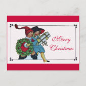 クリスマスプレゼントを持つ子供 シーズンポストカード (正面)