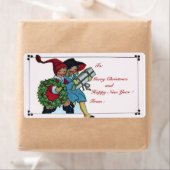 クリスマスプレゼントを持つ子供 ラベル (インサイチュ)