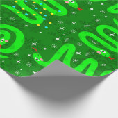 クリスマスヘビクリスマスが雪の結晶を緑色に点灯 ラッピングペーパー (角)