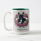 クリスマスベッドに閉じ込められた黒いフランス人 ツートーンマグカップ (左)