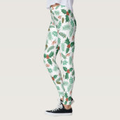 クリスマスホリーと松のコーンのパターンのレギンス レギンス (左)