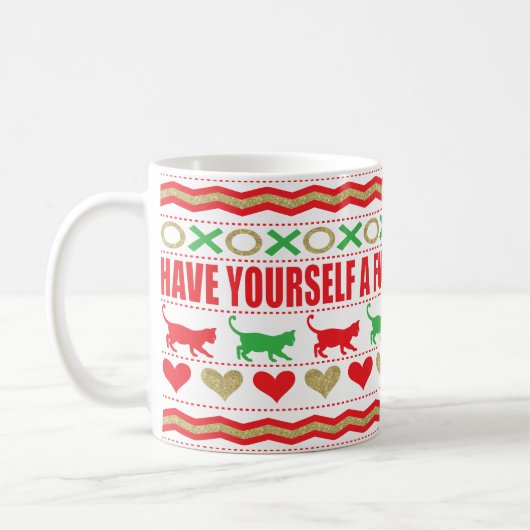 クリスマスマグカップ11オズ。「キャットマグファーリクリスマス」 コーヒーマグカップ (左)