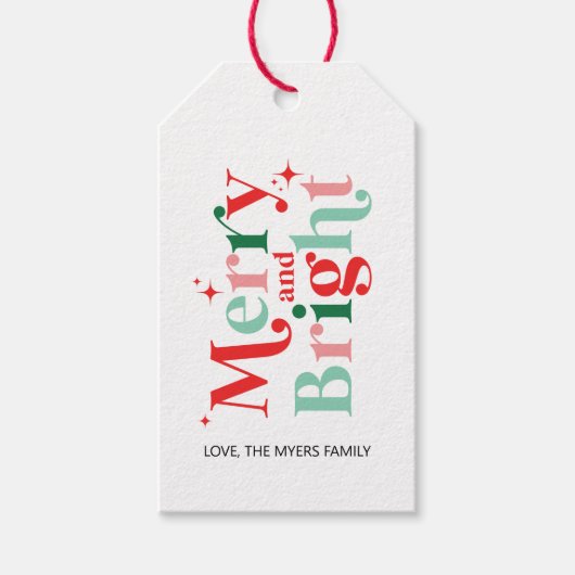 クリスマスメリーと鮮やかなピンクの赤い贈り物 ギフトタグ (正面)