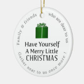 クリスマスメリープレゼントを少し持っている セラミックオーナメント (左)