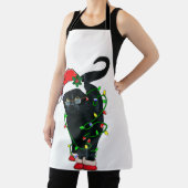 クリスマスライトに黒猫サンタがもつれた エプロン (インサイチュ)
