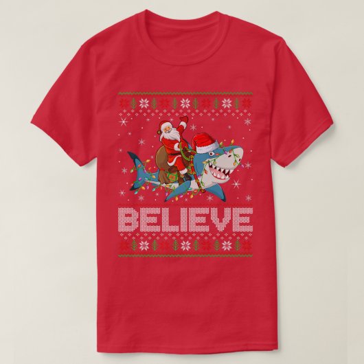 クリスマスライトシャーク信じ醜いサンタライディングサメ Tシャツ (デザイン正面)