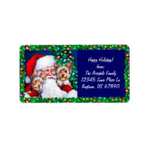 クリスマスラベルでのサンタのヨークシャーテリア