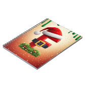 クリスマスリースのアクセントが付いたサンタの文字F 🎅 ノートブック (左側)