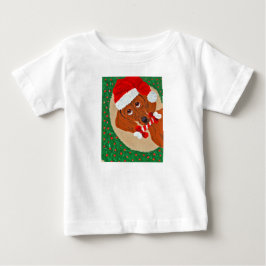 クリスマスリース越しのダックスフントのサンタクロース ベビーTシャツ