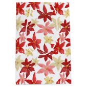 クリスマスレッドポインセチアフローラホリデーパターン ミディアムペーパーバッグ (正面)