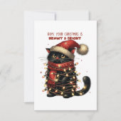 クリスマス包まれたの明かりが付いた可愛い猫。 カード (正面)