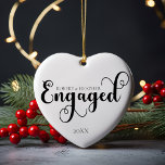 クリスマス婚約したの婚約ギフトをパーソナライズ セラミックオーナメント<br><div class="desc">私たち祝の婚約ギフトとの重要な大事な行事は婚約した2000年の初めてのクリスマスの美しいをカップルとして一緒にキャプチャすることを目的に作ら婚約したれたクリスマスセラミックオーナメント。このオーナメントは白と黒エレガントのクラシックでミニマルなデザインを備え、清潔で美しいを鑑賞する人に最適なシンプルものである。あなたはあなたの婚約を発表するか、または婚約者としてあなたの初めてのクリスマスを記念するかにかかわらず、この陶製のオーナメントカスタムは、控えめな洗練であなたの木を優雅に飾る永遠の記念品である。このオーナメントは詳細に注意を払って作られ、休日の装飾に意味のあるtouchを望むカップルにパーソナライズされた理想的である。このお洒落デザインは、あなたの名前、婚約の日付、または特別なメッセージを追加することができ、あなたの人生のこのユニーク刺激的な章の記念となる。そのミニマルな魅力は、それはあなたのスタイルであるかどうかに関係なく、クリスマスツリーを補完伝統的することを確モダン認する。婚約の発表、思いやりある贈り物、または初めてのクリスマスの記念品として完璧パーソナライズされたな、このオーナメントはあなたの愛の物語を尊重する素晴らしい方法である。そのエレガントシンプルさは、休日のシーズンごとに来婚約の喜びと興奮を思い出す、何年も大切にする傑出した作品である。</div>