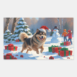 クリスマス帽子をかぶったフィンランドのラップランド犬が雪を駆ける 長方形シール