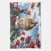 クリスマス帽子をかぶったペルシャ猫の雪上のポーズ キッチンタオル (縦)