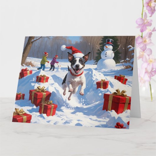 クリスマス帽子をかぶったラットテリアの雪遊び カード (蘭)