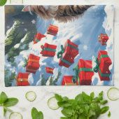 クリスマス帽子をかぶって雪に座るペルシャ猫 キッチンタオル (折り畳み)