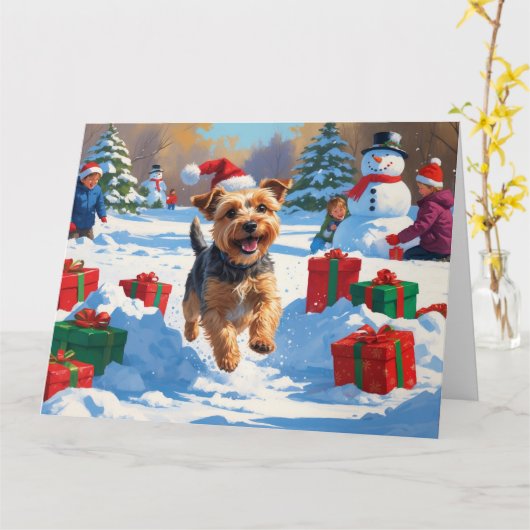 クリスマス帽子をかぶって雪の中を走るスカイテリア カード (黄色い花)