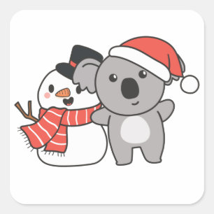クリスマス広場の冬に雪だるまを持つコアラ スクエアシール