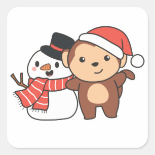 クリスマス広場の冬に雪だるまを持つサル スクエアシール