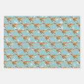 クリスマス恐竜のおもしろい水色 ラッピングペーパーシート (正面)