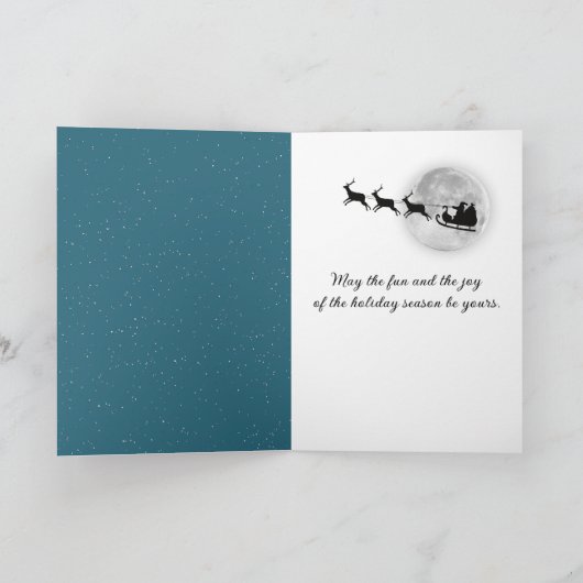 クリスマス犬がそりでサンタクロースを撮影 カード (内部)