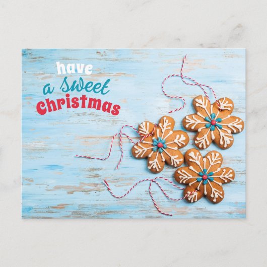 クリスマス用のジンジャーブレッドのはがきを持っている シーズンポストカード (正面)