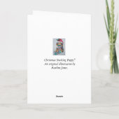 クリスマス用のストッキングを持つ黒と茶色の子犬 シーズンカード (裏面)