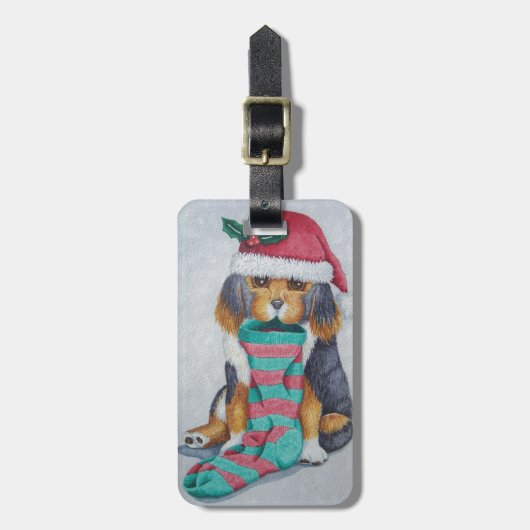 クリスマス用の服を着たかわいい黒と茶色の子犬 ラゲッジタグ (正面縦)