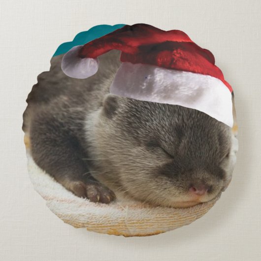 クリスマス眠いオッター ラウンドクッション (正面)