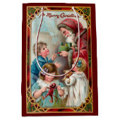 クリスマス神父と子ども ミディアムペーパーバッグ (正面)