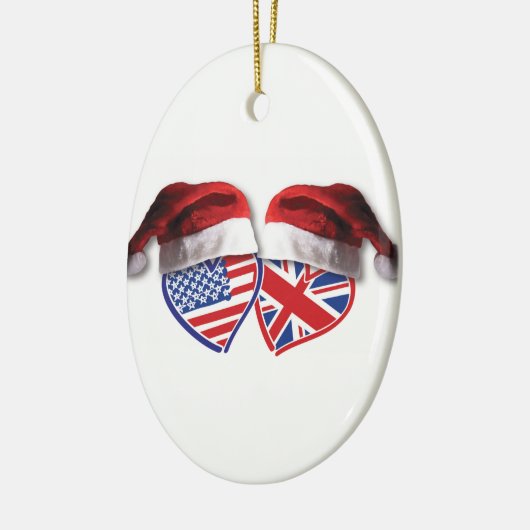 クリスマス米国およびサンタの帽子が付いているイギリスの旗のハート セラミックオーナメント (左)