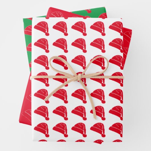 クリスマス赤い緑のサンタハットのパターンかわいい ラッピングペーパーシート (インサイチュ)