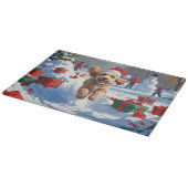 クリスマス走ハットで雪の中のコックポー カッティングボード (角)