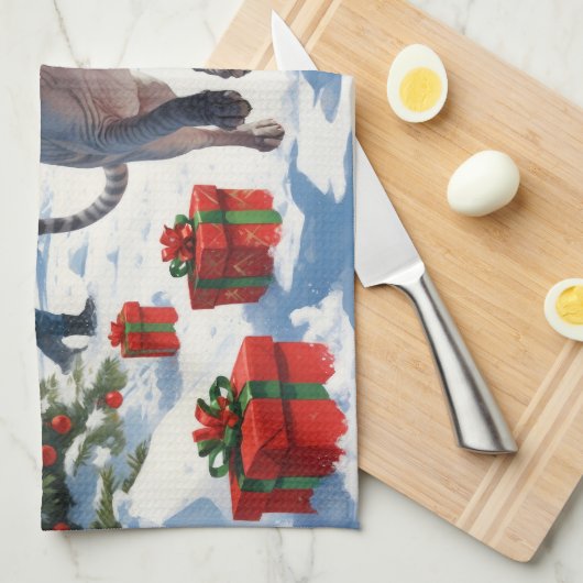 クリスマス走ハットで雪の中のスフィンクス猫 キッチンタオル (四つ折り)