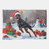 クリスマス走ハットで雪の中のドーバーマンの帽子 キッチンタオル (横)
