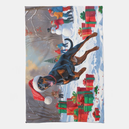 クリスマス走ハットで雪の中のドーバーマンの帽子 キッチンタオル (縦)