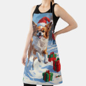 クリスマス走ハットで雪の中のパピロン犬 エプロン (インサイチュ)