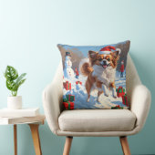 クリスマス走ハットで雪の中のパピロン犬 クッション (椅子)
