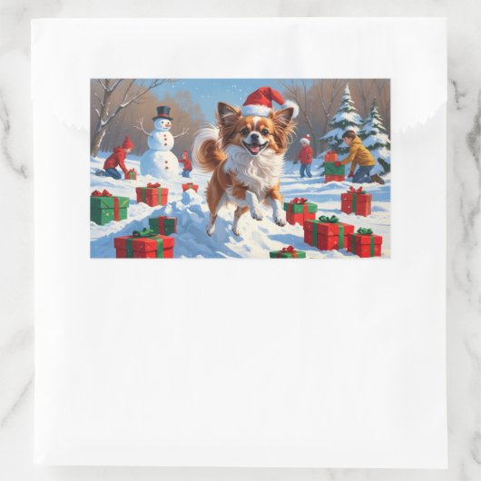 クリスマス走ハットで雪の中のパピロン犬 長方形シール (バッグ)
