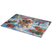 クリスマス走ハットで雪の中の北京犬の犬 カッティングボード (角)