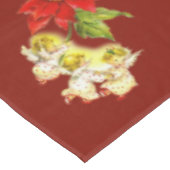 クリスマス踊りベビーエンジェルズオンレッド テーブルクロス (アングル)