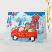 クリスマス配達トラックの雪の中のフレンチブルドッグ カード (黄色い花)